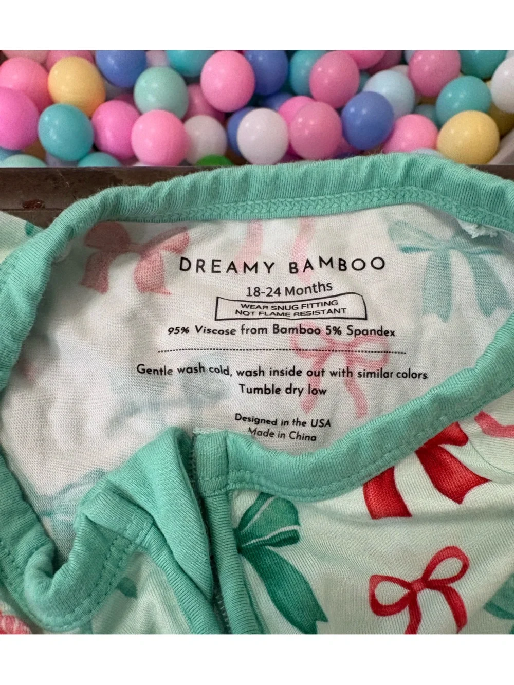 Holiday bows zip pajama
